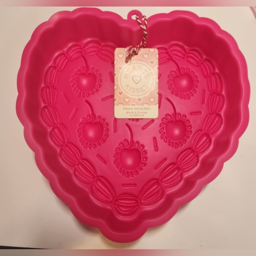 Heart-Shaped Pink Silicone Baking Mold With Cherries